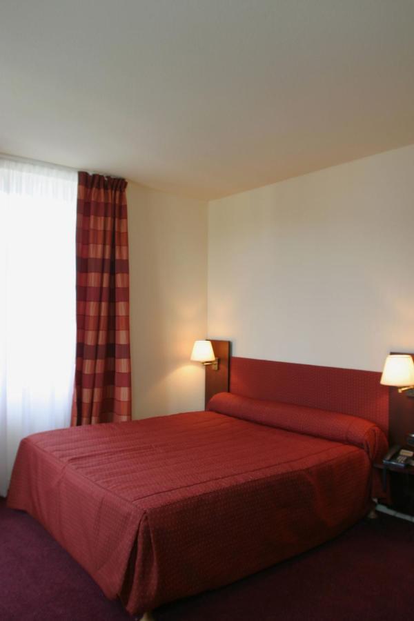 Le Parc Des Fees Hôtel Retaurant&Spa La Bourboule Quarto foto